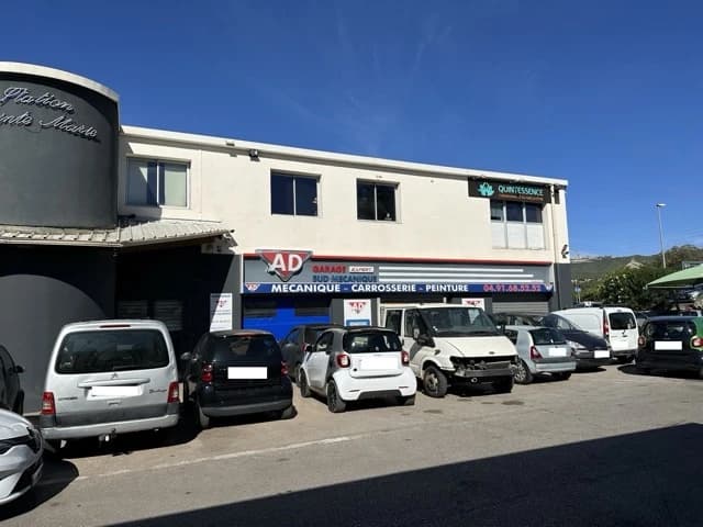 Façade du garage AD Expert Sud Mécanique et son parking, boulevard Bara à Château-Gombert, Marseille 13013